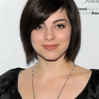 Short Black Straight Bob Haircut with Side Sweep Bangs - Krysta Rodriguez Haircuts
