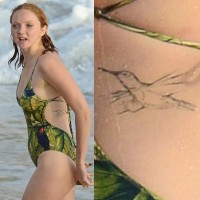 Lily Cole' Tattoos - Bird Tattoo on Lower Back