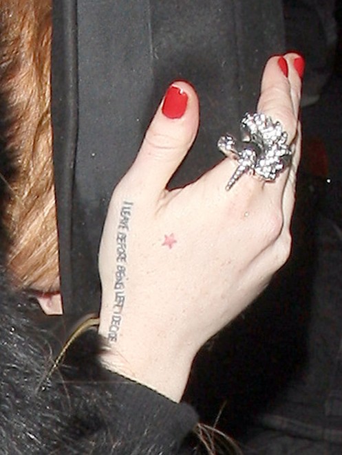 Lindsay Lohan Tattoos - Female Wrist Lettering Tattoo