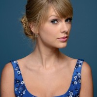 Taylor Swift Fishtail Bun Updo