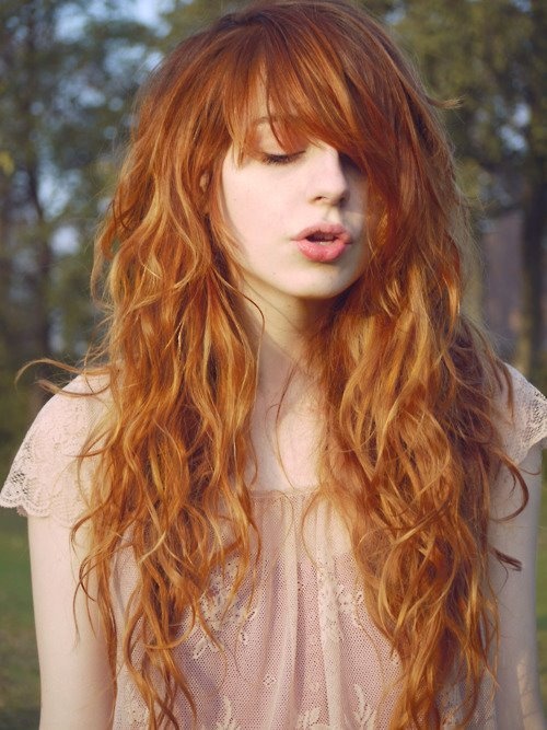 Red Colored Long Curly Hairstyle