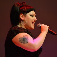 Beth Ditto's Tattoos - Heart Tattoo on Upper Arm
