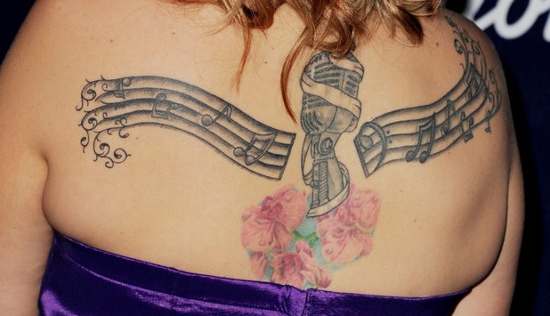 Erika Van Pelt's Tattoos - Artistic Design Tattoo on Back