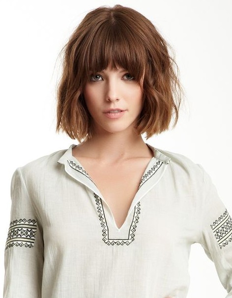 Tousled Curly Bob Hairstyle with Blunt Bangs
