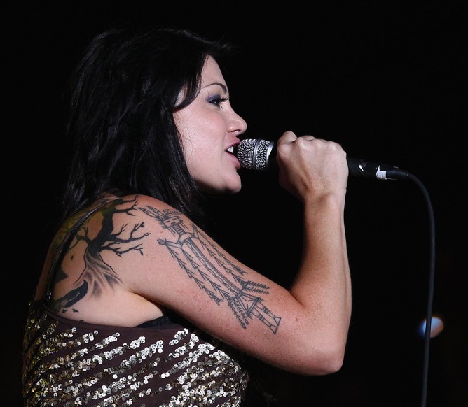 Vanessa Amorosi's Tattoos - Artistic Design Tattoo on Upper Arm
