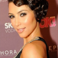 Short Pixie Brunette Curly Hairstyle