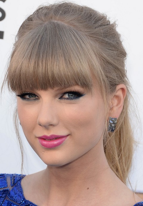 Taylor Swift Hairstyles: Blonde Ponytail with Blunt Bangs