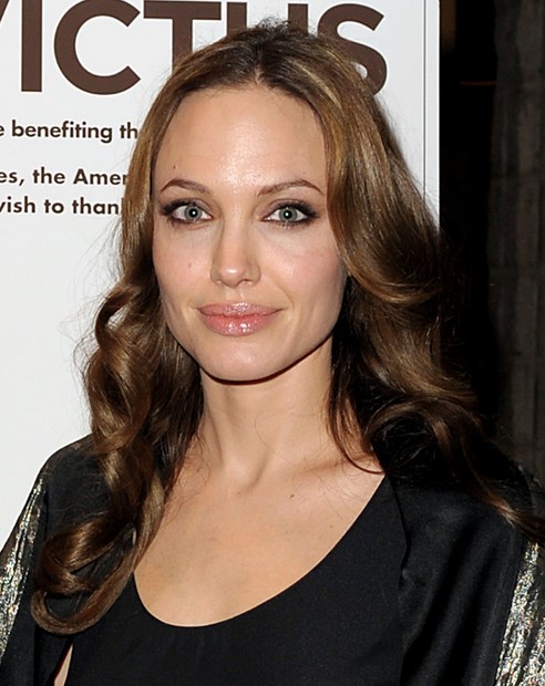 Angelina Jolie Long Hairstyle: Sleek Curls with Side Part