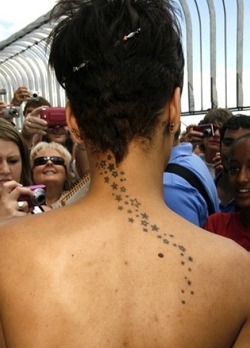 Awesome star tattoos designs for girls on back: Rihanna Tattoo