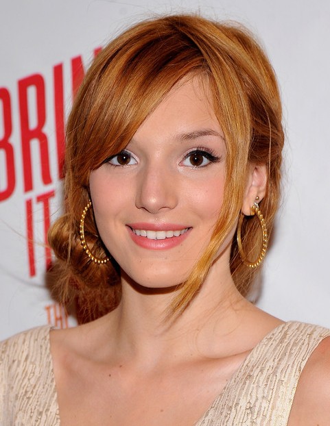 Bella Thorne Long Hairstyle: Loose Bun with Side Part