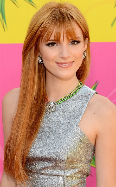 Bella Thorne Long Hairstyle: Strawberry-blonde Hair with Bangs