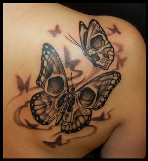 Butterfly Girl Skull Tatoo on Upper Back