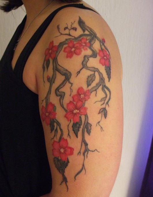Cherry Tattoos Designs: Pretty blossom tattoo on the arm