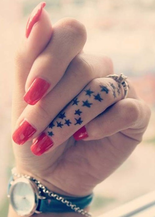 Cool small star tattoo designs: Finger tattoo ideas