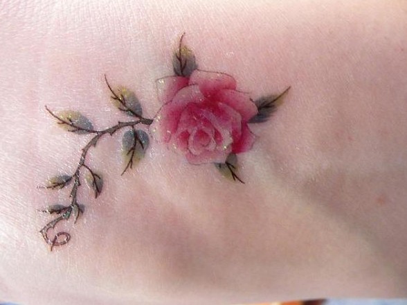 Cute little rose tattoos designs