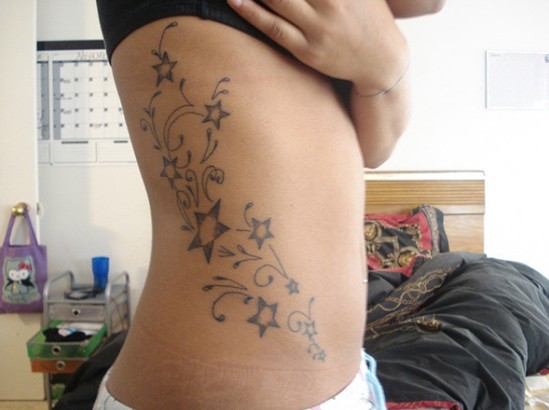 Star Tattoo Designs: Flower Star Tattoo on Side of Body