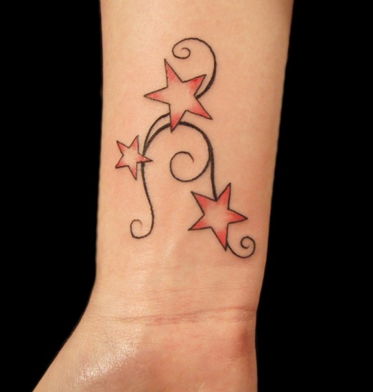 Star Tattoo Designs: Tribal Star Falling Tattoo