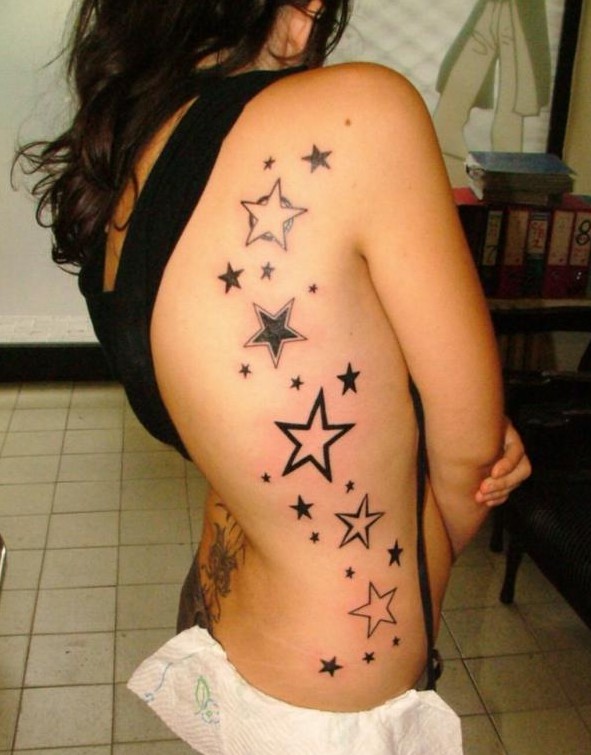 Star tattoo designs: Side of body tattoos for girls