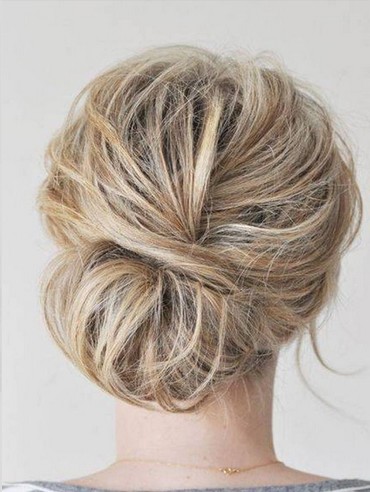The Messy Bun Hairstyle for Mid-length Blond Straight Hair