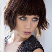 The Shaggy Wavy Bob Haircut with Rounded Full Blunt Bangs