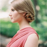 The Sleek Low Bun Hairstyle with Braid for Blond Straight Hair