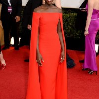 The Glamorous Golden Globe Style - The Best Supporting Actress nominee Lupita Nyong'o Ralph Lauren Collection bright red cape dress