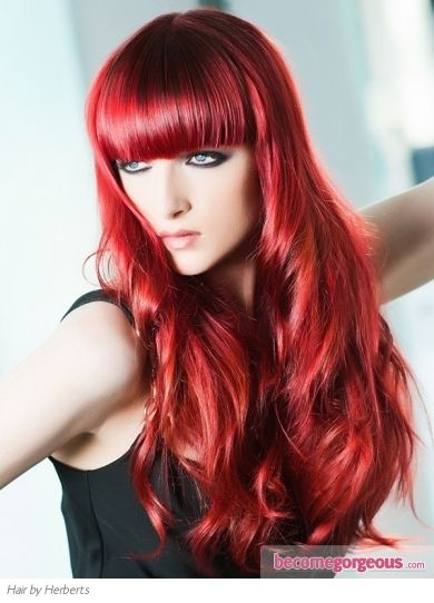 Best Hairstyles for Red Hair: Puffy Waves with Blunt Bangs