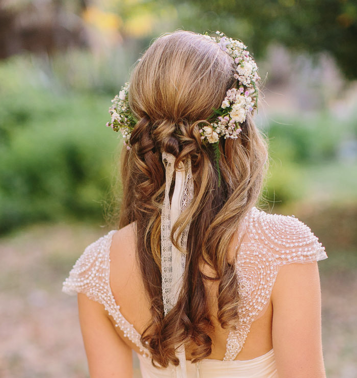 Image of wedding hairstyle with flowers