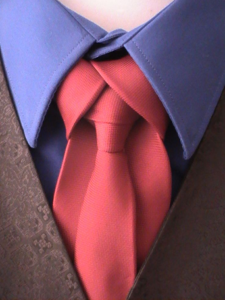 Red Tie against Blue Shirt