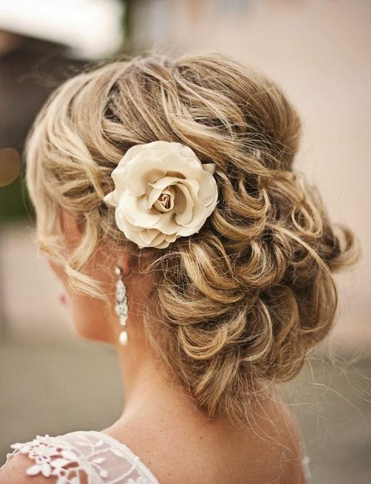Romantic Curly Updo Hairstyle with Flower