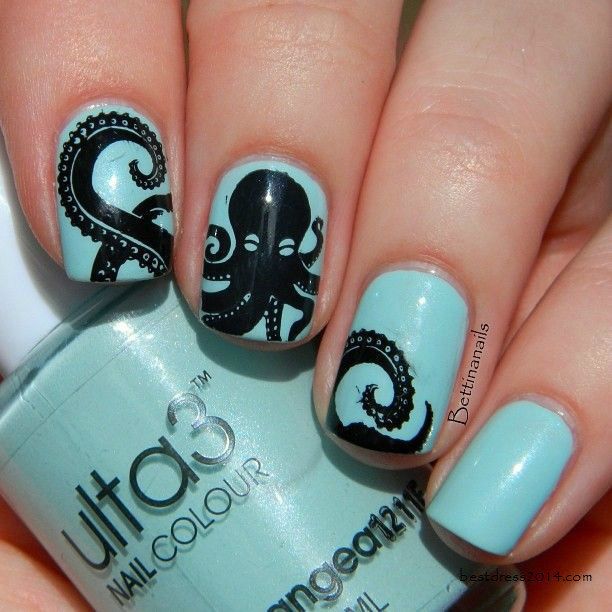 Baby Blue Colored Nails With Tribal Prints