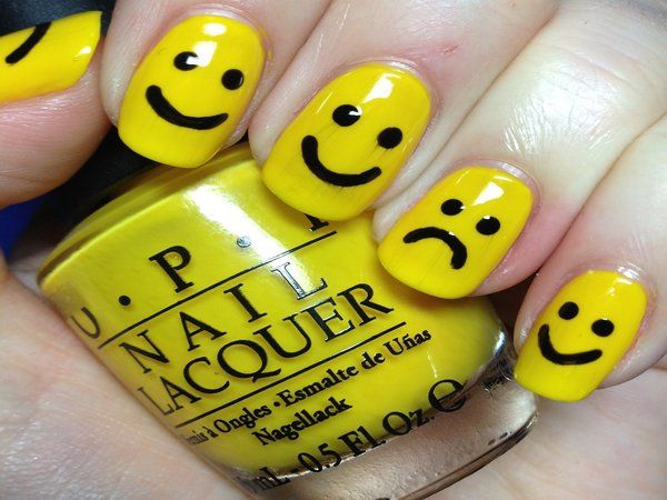 Bright Yellow Happy Face Nail Design