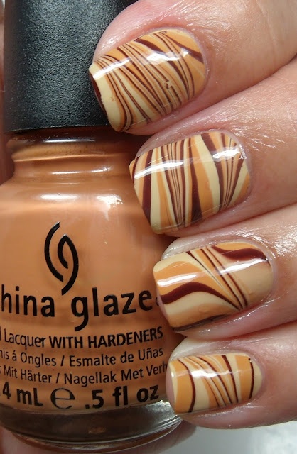 Chocolate Nail Design With Marble Prints