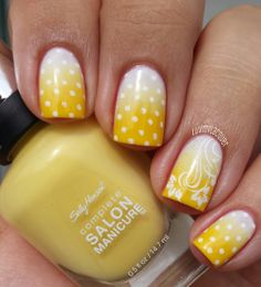 Dotted Yellow Nail Design