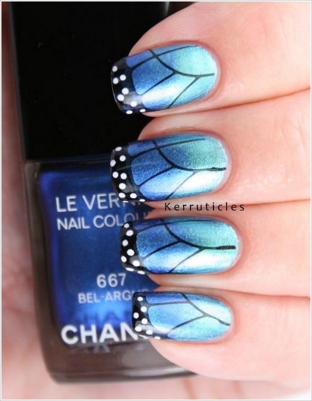 Metallic Blue Butterfly Nail Design