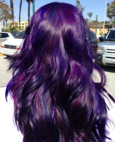 Purple and Red Highlighted Long Black Wavy Hairstyle