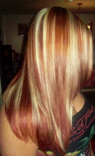 Sleek Blonde Hair With Red Highlights