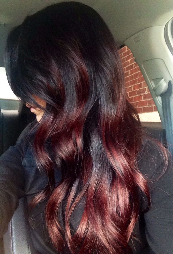 Vintage Styled Red Highlighted Long Black Wavy Hairstyle