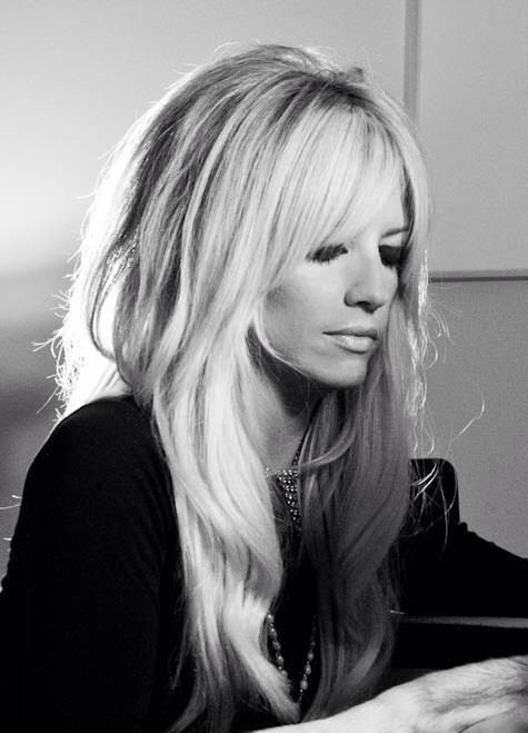 Long Layered Hairstyle With Bangs