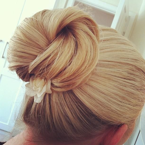 Lovely Sleek Updo Hairstyle with A Flower