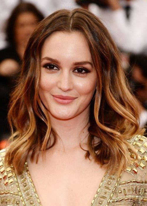 Center-parted Medium Curly Hairstyle