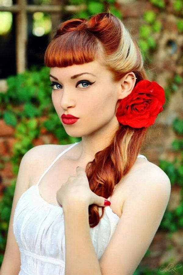 Bright Colored Retro Hairstyle With Flower