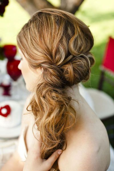 13 splendide acconciature a coda di cavallo per capelli ricci