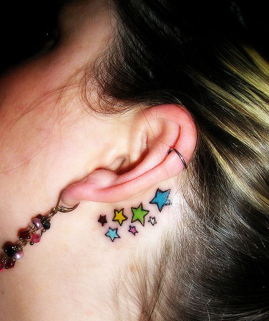 Colorful Star Tattoos behind Ears