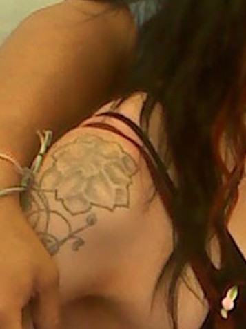 Ash Costellos tattoos – upper right arm flower tattoo