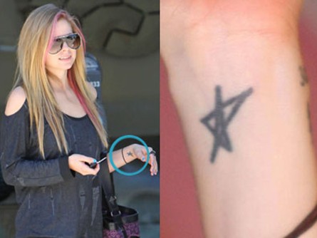 Avril Lavigne tattoos - star tattoo on left wrist