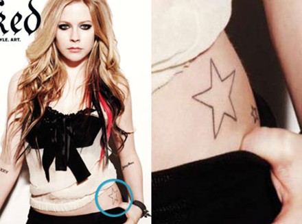Avril Lavigne tattoos - star tattoos on hip