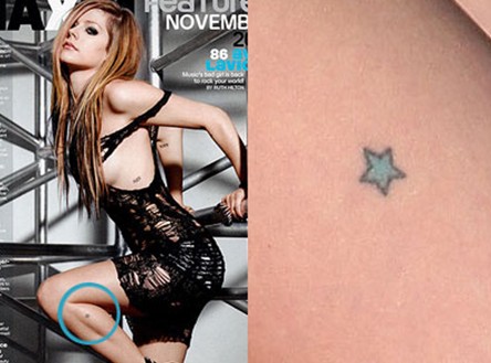 Avril Lavigne tattoos – blue star on leg