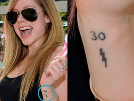 Avril Lavigne tattoos – ‘30’ and lightning-bolt tattoos on left wrist