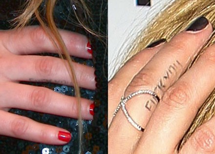Avril Lavigne tattoos – ‘FUCK YOU’ finger tattoo